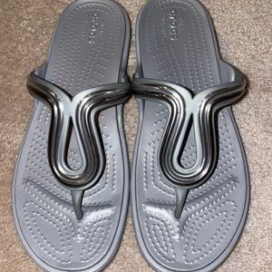 Crocs flip-flops, women’s size 8